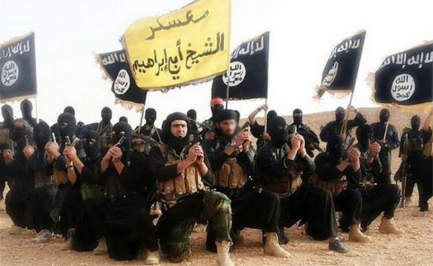 This picture shows how ISIS looks like as a troop, show how they dress up, and also their ISIS flag. 